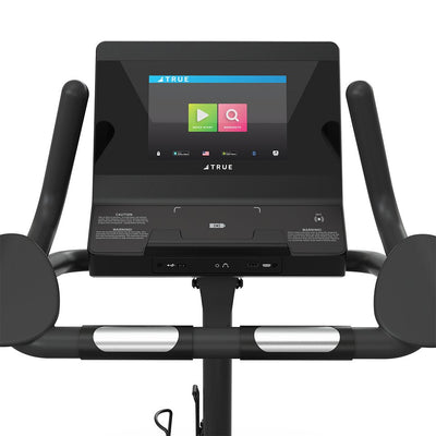 TRUE Launch Upright Bike – 30 Resistance Levels, Self-Generating  Fitness Specialist