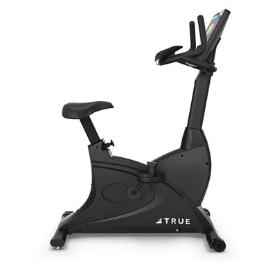 TRUE Launch Upright Bike – 30 Resistance Levels, Self-Generating  Fitness Specialist